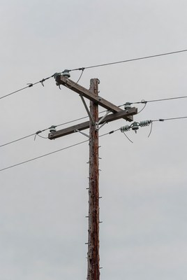 Power lines on a wooden pole