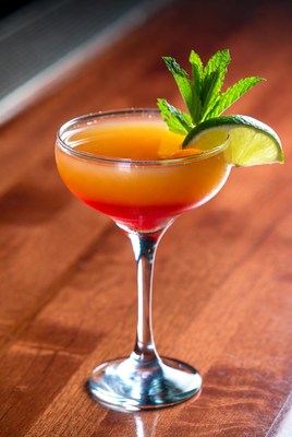 Colorful cocktail on wooden table