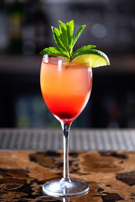 Colorful drink with mint and lime