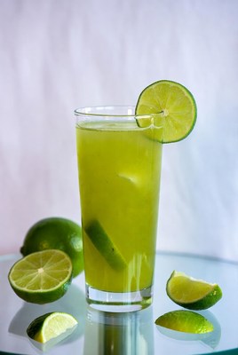 Fresh green drink with lime slices