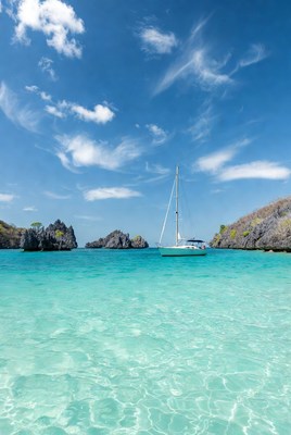 Sailing on clear blue water