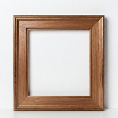 Wooden picture frame on white wall
