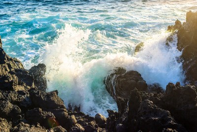Waves crashing against rocky shore