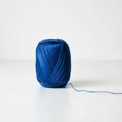 Blue yarn ball on a table