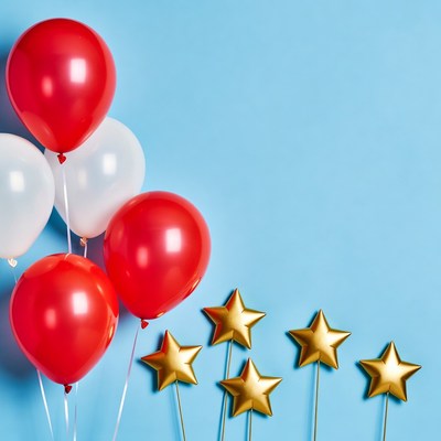 Red and white balloons with golden stars