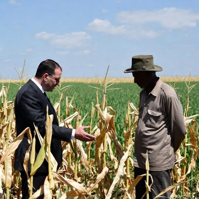Farm visit with farmer in field