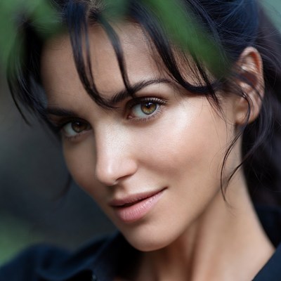 Woman smiling in nature setting