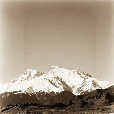 Snowy mountain peak under clear sky