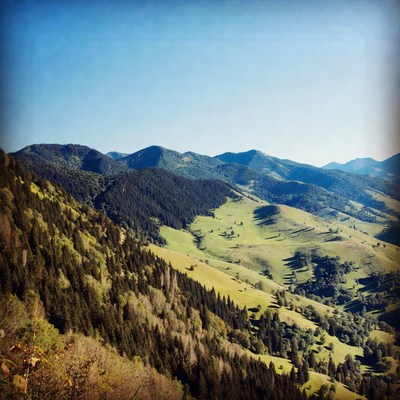 Mountains and hills under blue sky