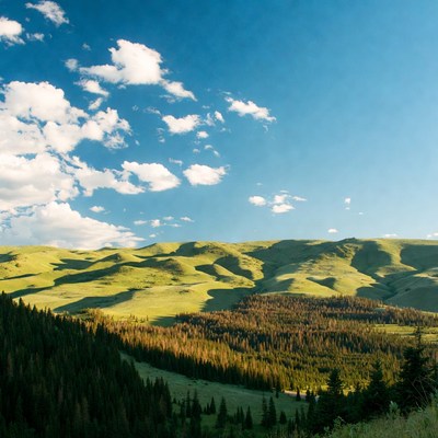 Green hills with blue sky