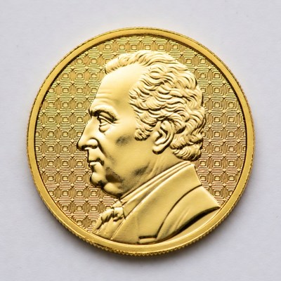 Golden coin showing profile of a person