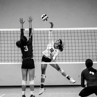Girls volleyball match at gymnasium court