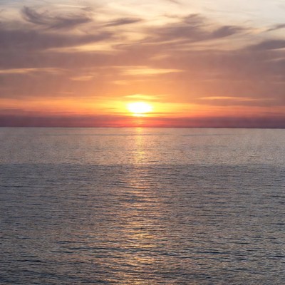 Sunset over the ocean on a clear evening
