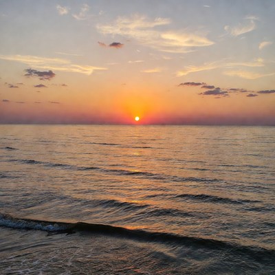 Sunset over the calm sea waters