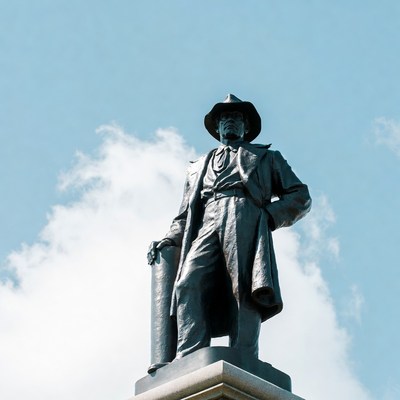Statue of a historical figure on a pedestal