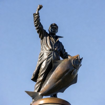 Fisherman statue in city square