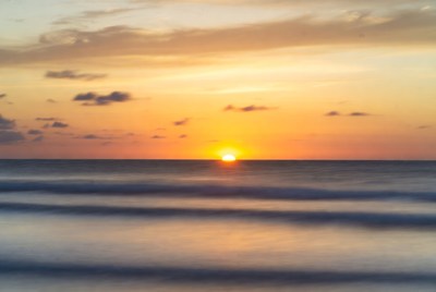 Sunset over the ocean horizon
