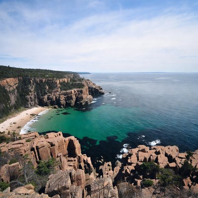 View of coastal cliffs and beach