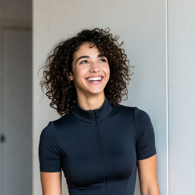 Woman smiles in indoor setting