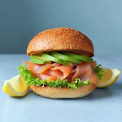 Fresh salmon sandwich with lemon slices