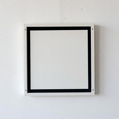 Empty frame on a white wall