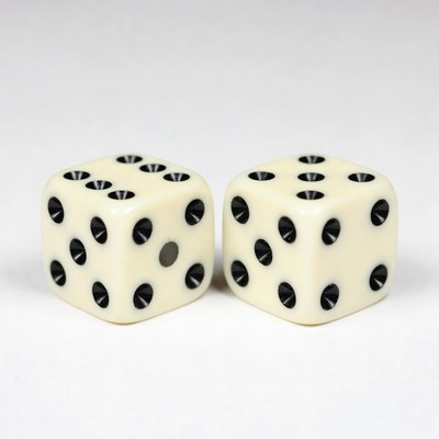 Dice resting on a plain surface