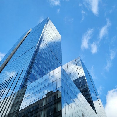 Skyward view of modern glass buildings