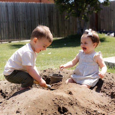 Playing in the sand outside