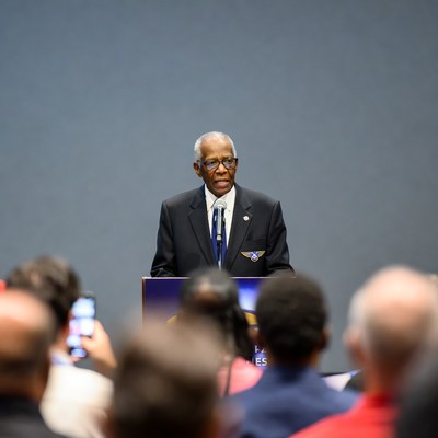 Speaker at conference event in evening