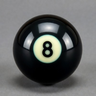 Eight ball on gray surface