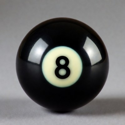Eight ball on flat surface