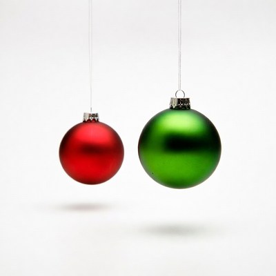 Red and green ornaments hanging together