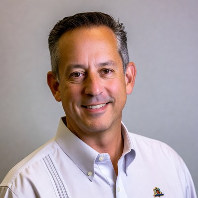 Professional man smiles for camera