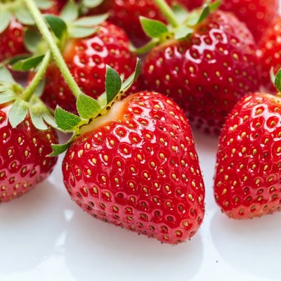 Fresh strawberries on a white table