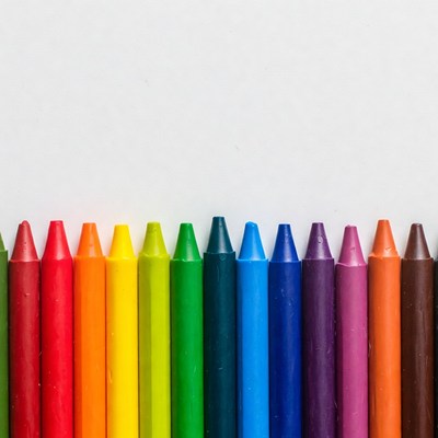 Crayons lined up on a table