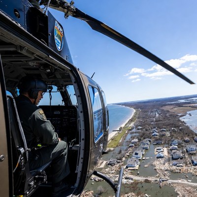 Helicopter survey of coastal damage