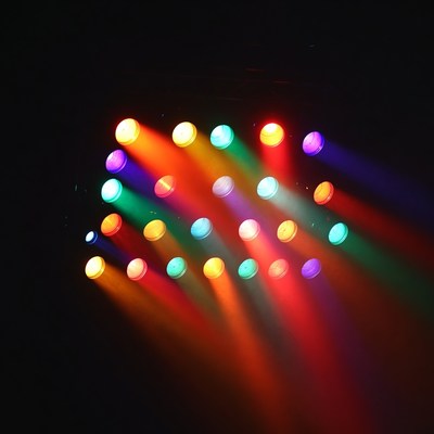 Colorful stage lights create vibrant patterns