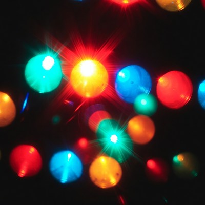 Colorful lights shine in darkness