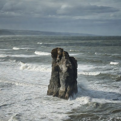 Rock formation in rough sea