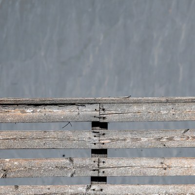Wooden plank dock above water
