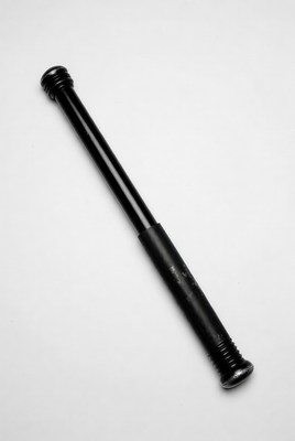 Black metal rod on white background