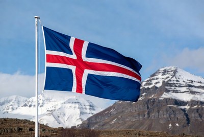 Iceland flag waving in the mountains