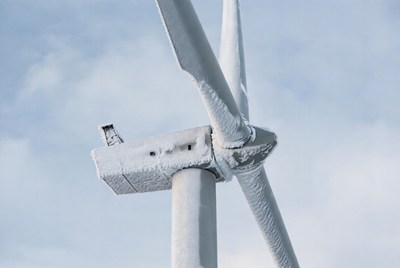 Wind turbine covered in snow