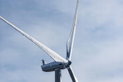 Snow covered wind turbine in winter