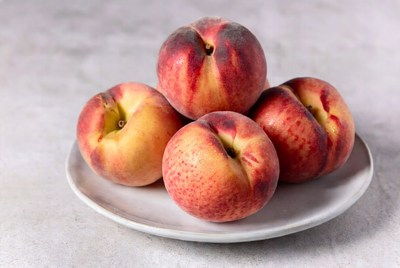 Fresh peaches on a plate