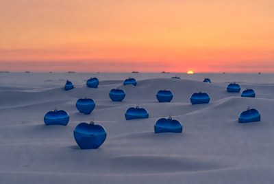 Blue hearts on snowy land