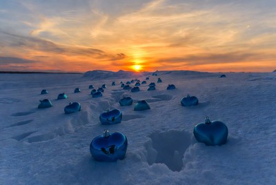 Hearts on a snowy landscape at sunset