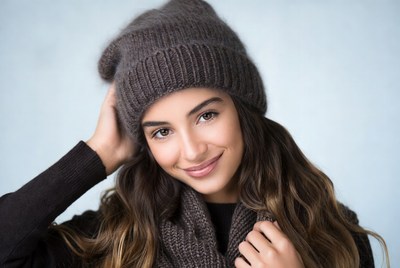Portrait of a smiling woman wearing a hat