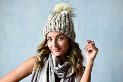 Woman wearing winter hat and scarf