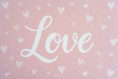 Love in pink hearts background